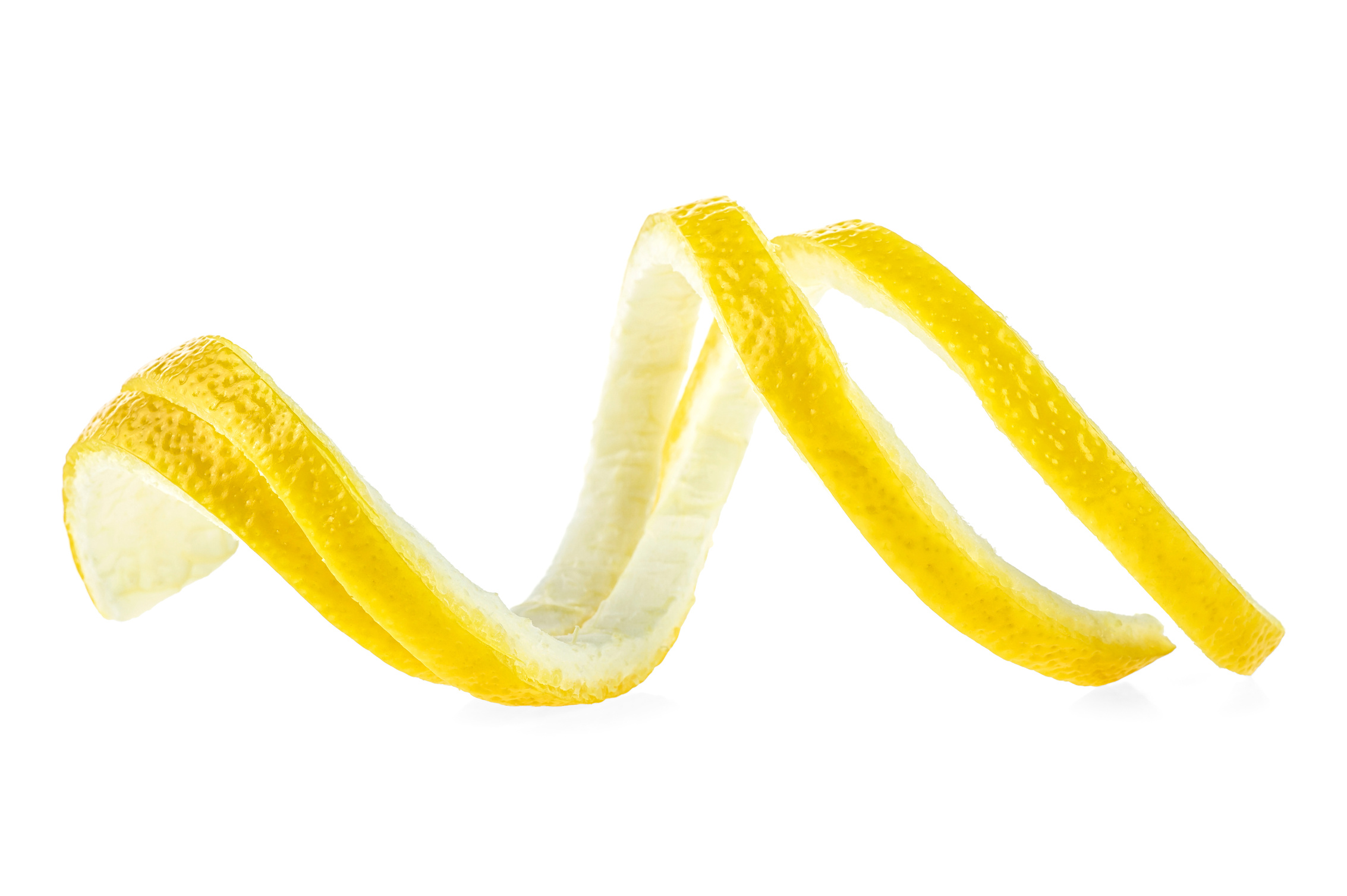 Lemon twist on a white background. Lemon peel.